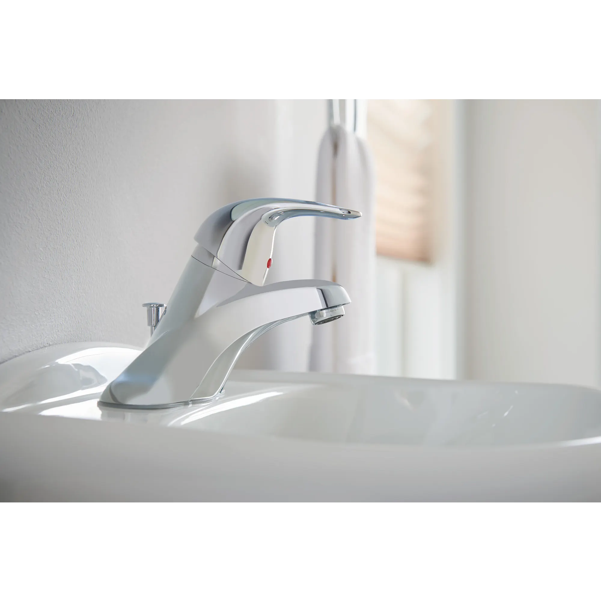 Adler Chrome one-handle low arc bathroom faucet - Image 6