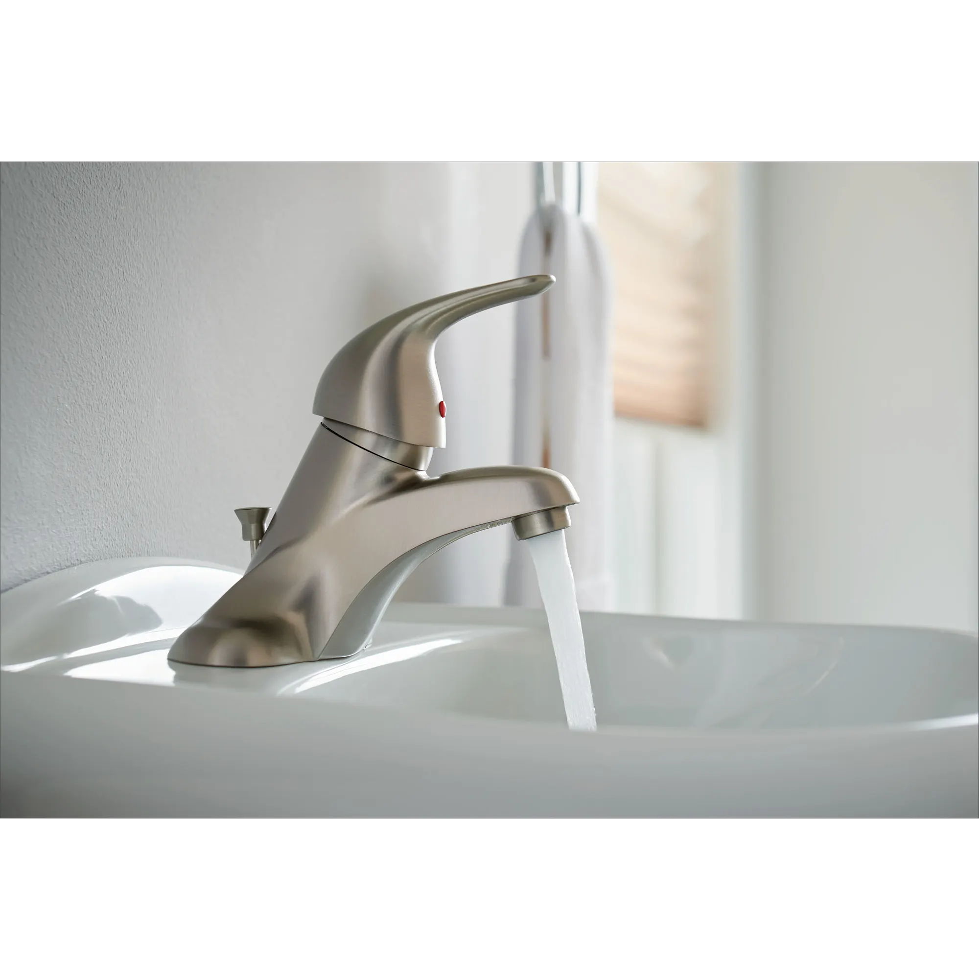 Adler Chrome one-handle low arc bathroom faucet - Image 11